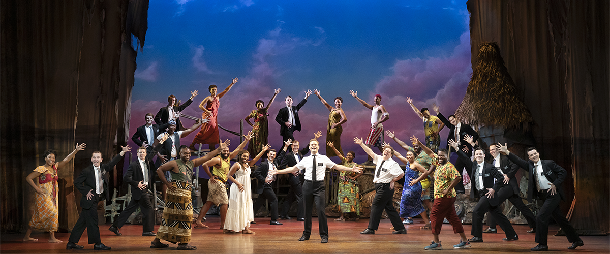 Sam McLellan and company in THE BOOK OF MORMON North American tour. Photo by Julieta Cervantes.