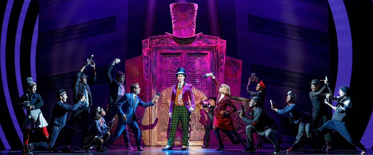 Noah Weisberg as Willy Wonka and company. Roald Dahl’s CHARLIE AND THE CHOCOLATE FACTORY. Photo by Joan Marcus ©