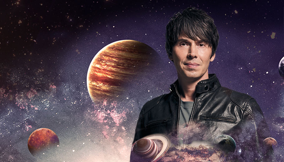 Brian Cox pictured against the background of space and planets