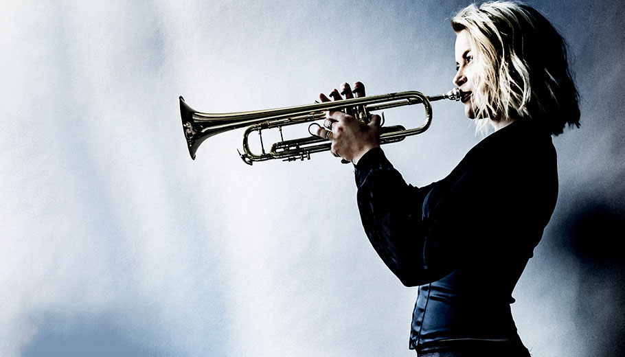 Bria Skonberg pictured playing trumpet