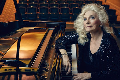 Judy Collins Pictured at the piano