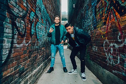 Cody Ko & Noel Miller pictured in an alley