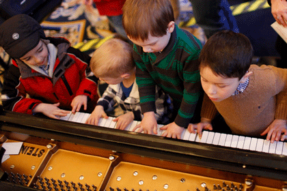 children playing a musical instrument