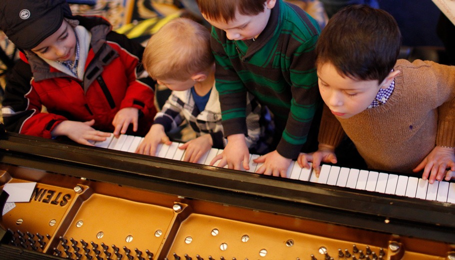 children playing with a musical instrument